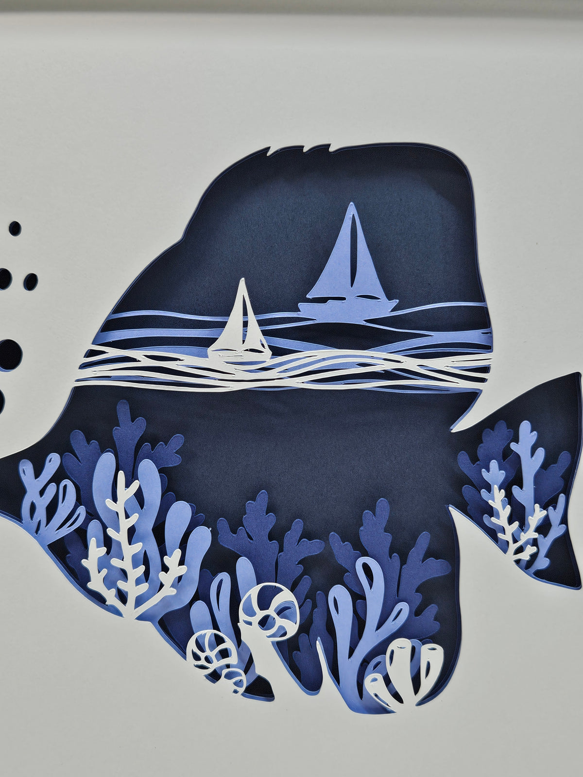 Tang Fish with coral and sail boats